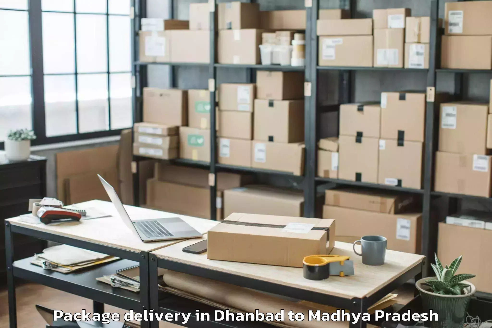 Affordable Dhanbad to Makhanlal Chaturvedi Rashtriya Package Delivery